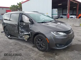 2020 Chrysler Pacifica Touring L with VIN 2C4RC1BG2LR289665, listed as a IAAI auction lot 42645933 with 96,265 mi miles and . Bid and sale history available at DreamBid. Image 1.
