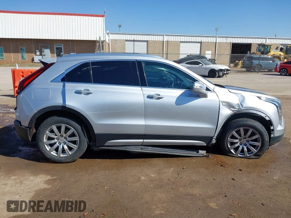 2019 Cadillac XT4 FWD Premium Luxury with VIN 1GYFZCR47KF110481, listed as a IAAI auction lot 41771338 with 103,124 mi miles. Bid and sale history available at carsss.com. Image 14.