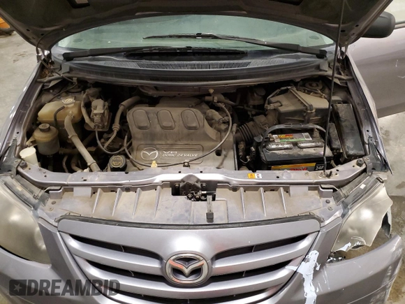 2004 Mazda MPV LX with VIN JM3LW28A440515066, listed as a Copart auction lot 61670365 with 106,995 mi miles and Clean title. Bid and sale history available at DreamBid. Image 12.
