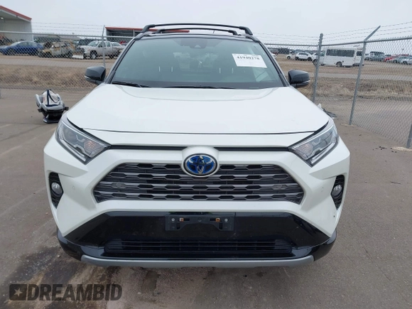 2021 Toyota RAV4 Hybrid XSE with VIN 2T3E6RFV4MW021009, listed as a IAAI auction lot 41940278 with 33,016 mi miles and . Bid and sale history available at DreamBid. Image 12.