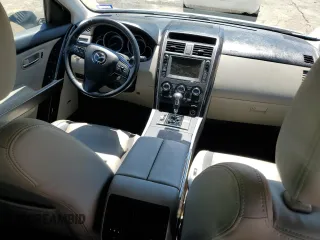 2011 Mazda CX-9 Grand Touring with VIN JM3TB3DA3B0306602, listed as a Copart auction lot 52611555 with 117,907 mi miles and Salvage title. Bid and sale history available at DreamBid. Image 8.