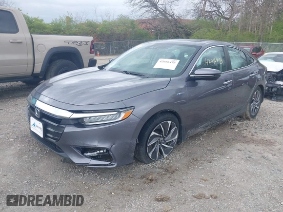 2021 Honda Insight Touring with VIN 19XZE4F91ME005517, listed as a IAAI auction lot 42036493 with 65,404 mi miles and . Bid and sale history available at carsss.com. Image 22.