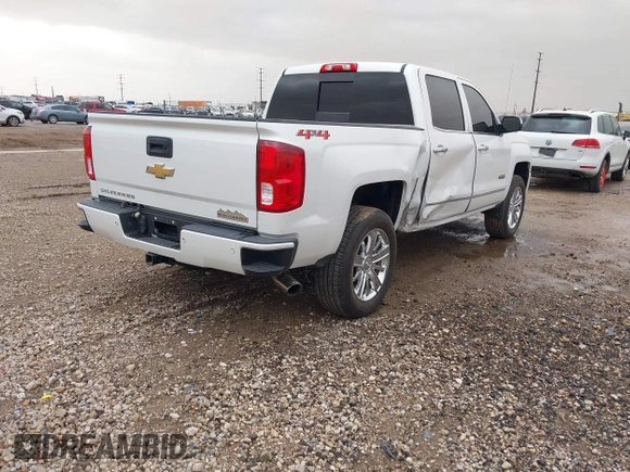 2018 Chevrolet Silverado 1500 High Country with VIN 3GCUKTEC1JG331991, listed as a IAAI auction lot 41718084 with 120,924 mi miles and . Bid and sale history available at DreamBid. Image 4.