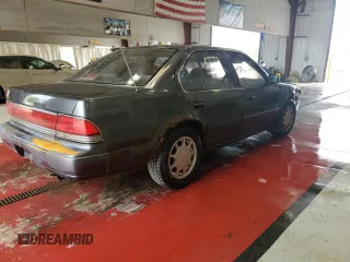 1990 Nissan Maxima с VIN JN1HJ01P3LT420451, выставлен на аукционе Copart как лот 60822275 с пробегом 146 196 миль миль и Списание • Salvage title. История ставок и продаж доступна на DreamBid. Изображение 3.