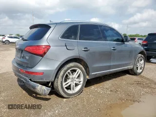 2014 Audi Q5 Premium Plus with VIN WA1LFAFP3EA013942, listed as a Copart auction lot 64371595 with 92,648 mi miles and Salvage title. Bid and sale history available at DreamBid. Image 3.