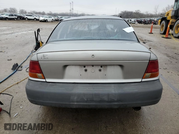 1998 Saturn SL z VIN 1G8ZG5288WZ306574, wystawiony jako Copart lot #86627384 z przebiegiem Nie podano mil oraz Nie do naprawy. Historia ofert i sprzedaży dostępna na DreamBid. Obrazek 6.