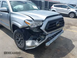2023 Toyota Tacoma SR with VIN 3TYCZ5AN4PT149730, listed as a IAAI auction lot 42083146 with 31,731 mi miles and . Bid and sale history available at DreamBid. Image 6.