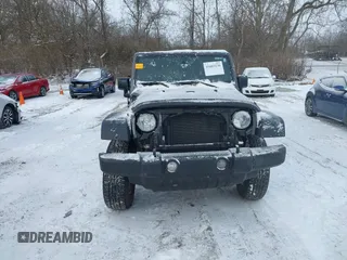 2016 Jeep Wrangler Unlimited Rubicon with VIN 1C4BJWFG7GL192698, listed as a IAAI auction lot 41603236 with 69,620 mi miles. Bid and sale history available at carsss.com. Image 12.