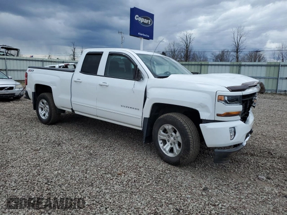 2017 Chevrolet Silverado 1500 LT with VIN 1GCVKREC3HZ216455, listed as a Copart auction lot 52576385 with 73,528 mi miles and Salvage Title. Bid and sale history available at DreamBid. Image 4.