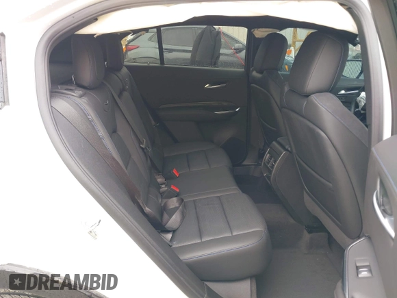 2024 Cadillac XT4 AWD Sport with VIN 1GYFZFR40RF223782, listed as a IAAI auction lot 42295745 with 7,254 mi miles and . Bid and sale history available at DreamBid. Image 8.