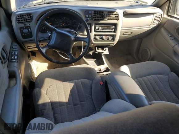 2000 Chevrolet Blazer LT z VIN 1GNDT13W8Y2119632, wystawiony jako Copart lot #47387175 z przebiegiem 140 356 mil mil oraz Szkoda całkowita • Salvage title. Historia ofert i sprzedaży dostępna na DreamBid. Obrazek 8.