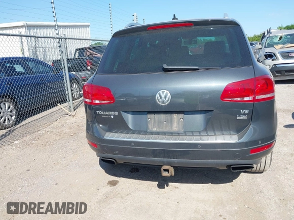 2012 Volkswagen Touareg Sport z VIN WVGFF9BP3CD003376, wystawiony jako IAAI lot #42249714 z przebiegiem 248 635 mil mil oraz . Historia ofert i sprzedaży dostępna na DreamBid. Obrazek 16.