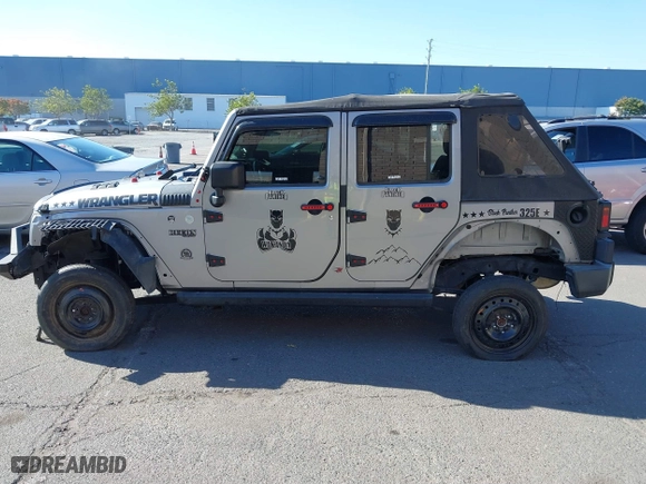 2015 Jeep Wrangler Unlimited Sport with VIN 1C4BJWDG7FL587014, listed as a IAAI auction lot 40641034 with 81,045 mi miles. Bid and sale history available at carsss.com. Image 15.