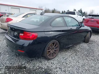 2015 BMW 2 Series M235i with VIN WBA1J7C55FV358527, listed as a IAAI auction lot 41839031 with 81,900 mi miles and . Bid and sale history available at carsss.com. Image 4.