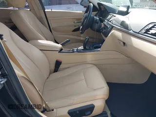 2014 BMW 3 Series 328i with VIN WBA3C1C55EK115218, listed as a IAAI auction lot 41824817 with 101,941 mi miles. Bid and sale history available at carsss.com. Image 5.