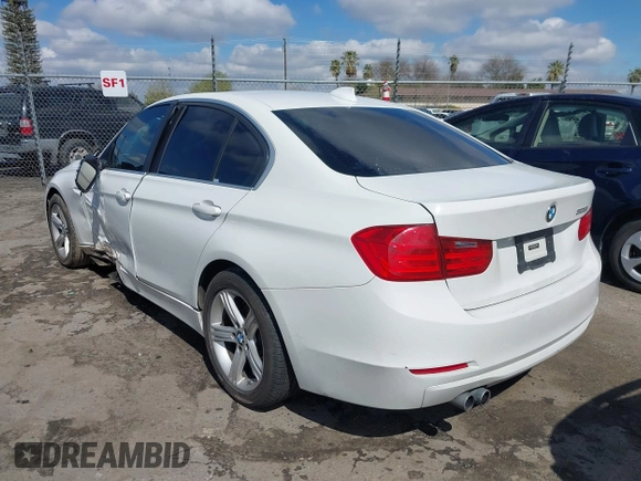 2015 BMW 3 Series 328i with VIN WBA3C1C5XFK117788, listed as a IAAI auction lot 41752178 with 154,030 mi miles and . Bid and sale history available at carsss.com. Image 3.