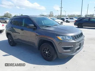 2017 Jeep Compass Sport z VIN 3C4NJDAB7HT658035, wystawiony jako IAAI lot #41545683 z przebiegiem 78 899 mil mil oraz . Historia ofert i sprzedaży dostępna na DreamBid. Obrazek 1.
