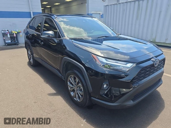 2022 Toyota RAV4 Hybrid XLE Premium z VIN 4T3B6RFVXNU071885, wystawiony jako IAAI lot #42730174 z przebiegiem 53 502 mil mil oraz . Historia ofert i sprzedaży dostępna na DreamBid. Obrazek 14.