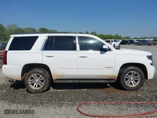 2015 Chevrolet Tahoe LT with VIN 1GNSCBKC4FR171297, listed as a IAAI auction lot 42017924 with 230,165 mi miles. Bid and sale history available at carsss.com. Image 13.
