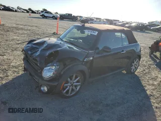 2015 MINI Convertible with VIN WMWZN3C53FT862859, listed as a Copart auction lot 71419764 with 113,356 mi miles and Salvage title. Bid and sale history available at DreamBid. Image 1.