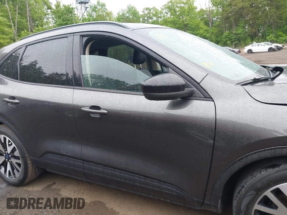 2020 Ford Escape SE Sport Hybrid with VIN 1FMCU0BZ0LUC52871, listed as a IAAI auction lot 42225741 with Not provided miles and . Bid and sale history available at DreamBid. Image 12.