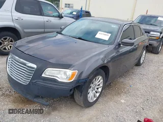 2013 Chrysler 300 with VIN 2C3CCAAG4DH588190, listed as a IAAI auction lot 42476895 with 224,837 mi miles and . Bid and sale history available at DreamBid. Image 2.