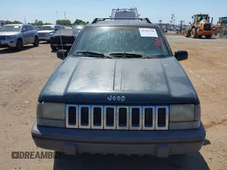 1994 Jeep Grand Cherokee Laredo with VIN 1J4GZ58S2RC118502, listed as a IAAI auction lot 42701778 with 420,559 mi miles and . Bid and sale history available at DreamBid. Image 6.