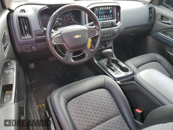 2018 Chevrolet Colorado z VIN 1GCHSDEN1J1251680, wystawiony jako Copart lot #76588774 z przebiegiem 83 630 mil mil oraz Szkoda całkowita • Salvage title. Historia ofert i sprzedaży dostępna na DreamBid. Obrazek 8.