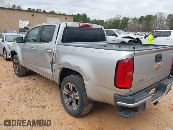 2018 Chevrolet Colorado 2WD Work Truck with VIN 1GCGSBEN5J1306373, listed as a IAAI auction lot 41843621 with 94,766 mi miles and . Bid and sale history available at DreamBid. Image 3.