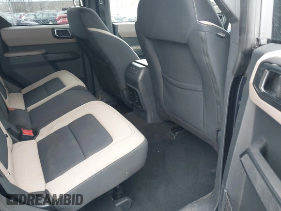 2021 Ford Bronco with VIN 1FMDE5BH8MLA83132, listed as a IAAI auction lot 41729825 with 31,192 mi miles and . Bid and sale history available at DreamBid. Image 8.