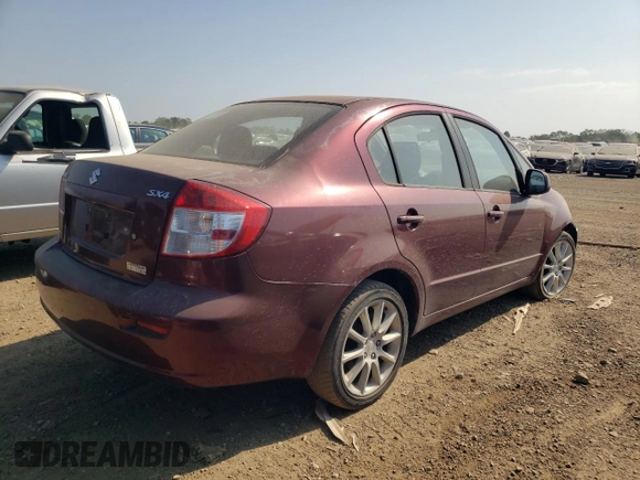 2011 Suzuki SX4 LE with VIN JS2YC5A2XB6302991, listed as a Copart auction lot 68815864 with 82,464 mi miles and Salvage Title. Bid and sale history available at carsss.com. Image 3.