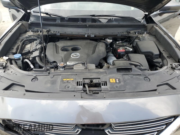 2018 Mazda CX-9 Grand Touring z VIN JM3TCBDY9J0208533, wystawiony jako Copart lot #59854635 z przebiegiem 90 263 mil mil oraz Szkoda całkowita • Salvage title. Historia ofert i sprzedaży dostępna na DreamBid. Obrazek 12.