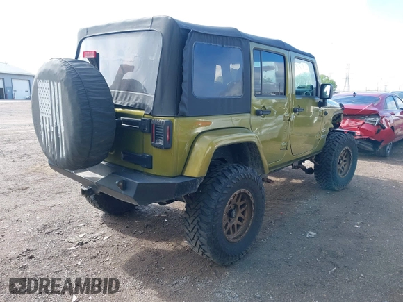 2008 Jeep Wrangler Unlimited Sahara with VIN 1J4GA59148L545255, listed as a IAAI auction lot 42177758 with 155,953 mi miles and . Bid and sale history available at DreamBid. Image 4.