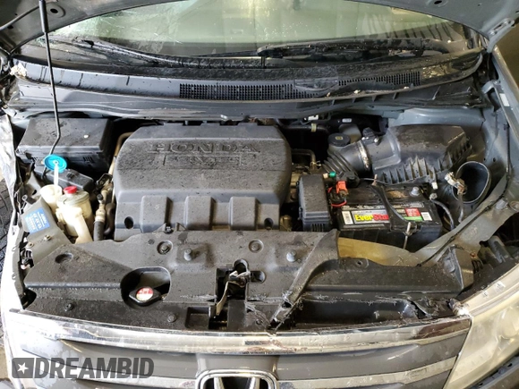 2012 Honda Odyssey Touring with VIN 5FNRL5H98CB028309, listed as a Copart auction lot 57663485 with 233,921 mi miles and Salvage title. Bid and sale history available at DreamBid. Image 12.