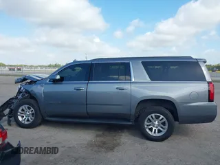 2020 Chevrolet Suburban LT z VIN 1GNSCHKC8LR157188, wystawiony jako IAAI lot #41578614 z przebiegiem 82 566 mil mil oraz . Historia ofert i sprzedaży dostępna na DreamBid. Obrazek 14.
