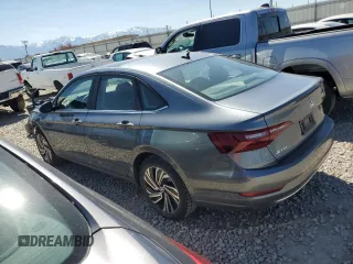 2021 Volkswagen Jetta SEL with VIN 3VWE57BU6MM052524, listed as a Copart auction lot 55524055 with 64,748 mi miles and Salvage title. Bid and sale history available at DreamBid. Image 2.