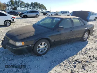 1997 Cadillac Seville Touring STS with VIN 1G6KY529XVU805064, listed as a Copart auction lot 83955324 with 111,215 mi miles and Clean Title. Bid and sale history available at carsss.com. Image 1.