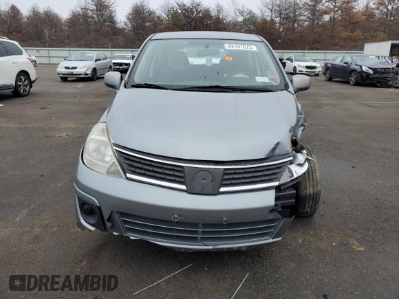 2009 Nissan Versa 1.8 SL with VIN 3N1BC13E19L480288, listed as a Copart auction lot 54111164 with 105,865 mi miles and Non Repairable. Bid and sale history available at carsss.com. Image 5.