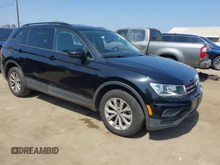 2018 Volkswagen Tiguan S z VIN 3VV1B7AX7JM092033, wystawiony jako IAAI lot #42373619 z przebiegiem 124 775 mil mil oraz . Historia ofert i sprzedaży dostępna na DreamBid. Obrazek 1.