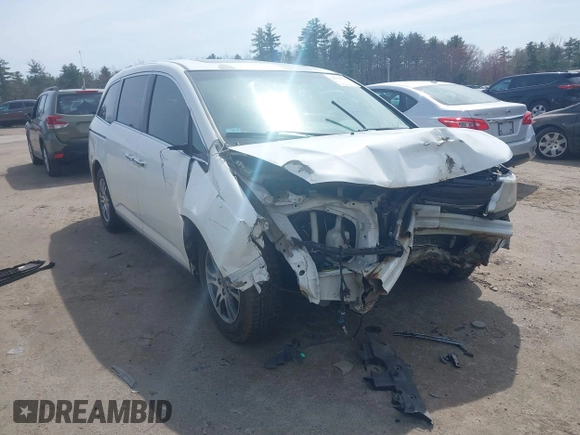 2012 Honda Odyssey EX-L with VIN 5FNRL5H65CB082916, listed as a IAAI auction lot 42052713 with 217,267 mi miles and . Bid and sale history available at carsss.com. Image 6.