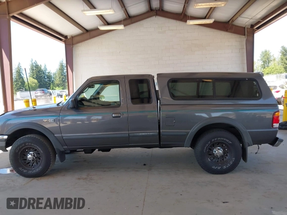 1998 Ford Ranger XL z VIN 1FTZR15X3WPA13348, wystawiony jako IAAI lot #42374950 z przebiegiem 239 535 mil mil oraz . Historia ofert i sprzedaży dostępna na DreamBid. Obrazek 14.
