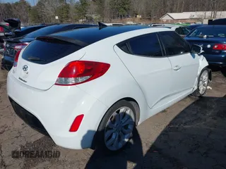 2013 Hyundai Veloster w/Black Int with VIN KMHTC6AD5DU116443, listed as a IAAI auction lot 41635858 with 170,173 mi miles and . Bid and sale history available at DreamBid. Image 4.