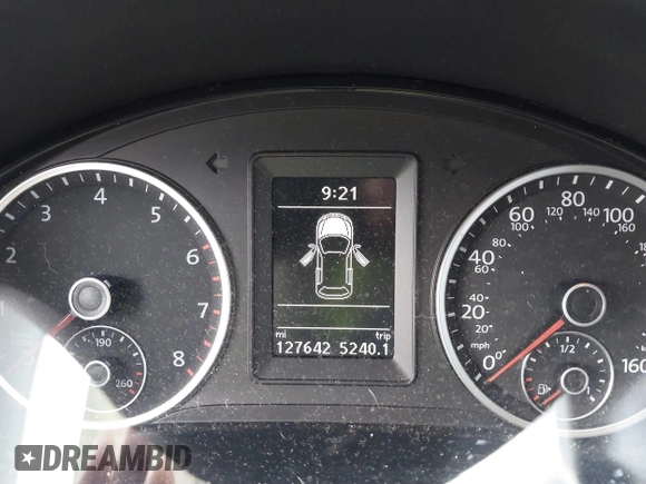 2015 Volkswagen Tiguan SE z VIN WVGBV7AX8FW582171, wystawiony jako IAAI lot #41442290 z przebiegiem 127 642 mil mil oraz . Historia ofert i sprzedaży dostępna na DreamBid. Obrazek 7.