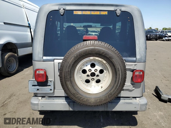 2002 Jeep Wrangler X with VIN 1J4FA39S32P708163, listed as a Copart auction lot 69703254 with 119,843 mi miles and Salvage Title. Bid and sale history available at carsss.com. Image 6.