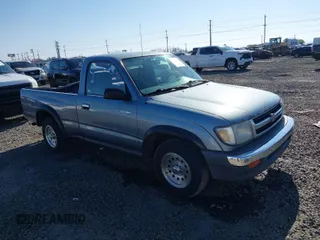 1998 Toyota Tacoma with VIN 4TANL42N4WZ029983, listed as a IAAI auction lot 41703048 with 411,928 mi miles. Bid and sale history available at carsss.com. Image 1.