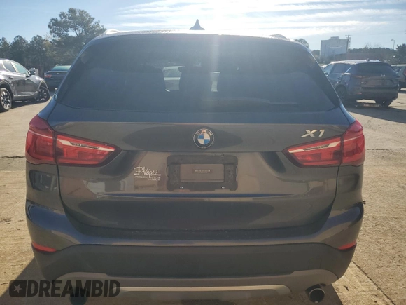 2016 BMW X1 xDrive28i z VIN WBXHT3Z30G4A47563, wystawiony jako Copart lot #50252555 z przebiegiem 99 975 mil mil oraz Szkoda całkowita • Salvage title. Historia ofert i sprzedaży dostępna na DreamBid. Obrazek 6.