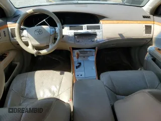 2005 Toyota Avalon XL z VIN 4T1BK36B95U005898, wystawiony jako Copart lot #54469595 z przebiegiem 176 901 mil mil oraz Szkoda całkowita • Salvage title. Historia ofert i sprzedaży dostępna na DreamBid. Obrazek 8.