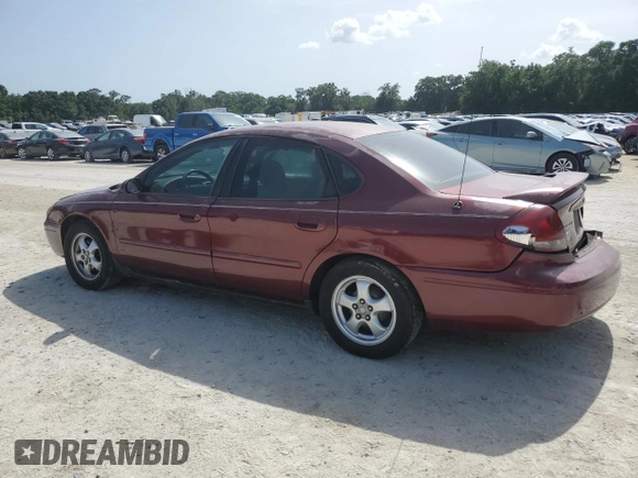 2007 Ford Taurus SE with VIN 1FAFP53U17A151246, listed as a Copart auction lot 60221955 with 284,321 mi miles and Salvage title. Bid and sale history available at DreamBid. Image 2.
