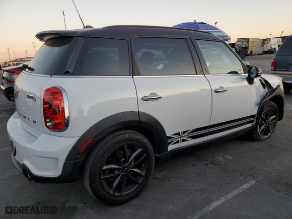 2014 MINI Cooper Countryman S with VIN WMWZC3C56EWP25014, listed as a Copart auction lot 88440985 with 95,058 mi miles and Salvage Title. Bid and sale history available at carsss.com. Image 3.