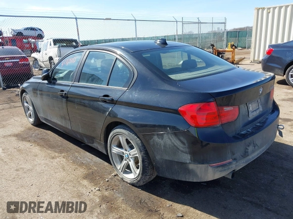 2015 BMW 3 Series 320i with VIN WBA3B1C58F5A05933, listed as a IAAI auction lot 41749755 with Not Provided miles. Bid and sale history available at carsss.com. Image 3.